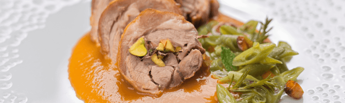 Shoulder of lamb stuffed with mint, roasted pistachios and apricot