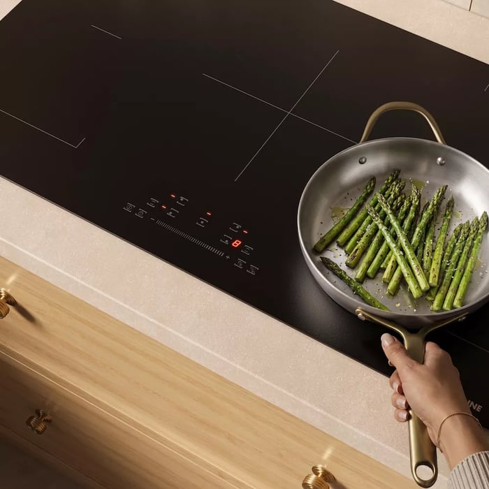 Cooktops vs. Rangetops: Asparagus cooking on induction cooktop.