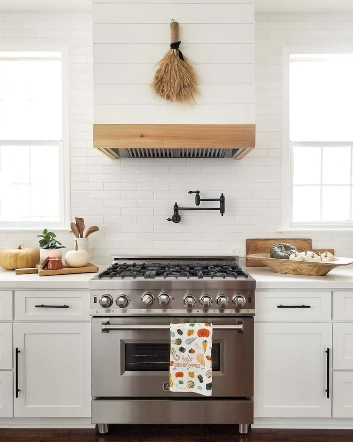 Custom Shiplap Range Hood in a rustic-style kitchen