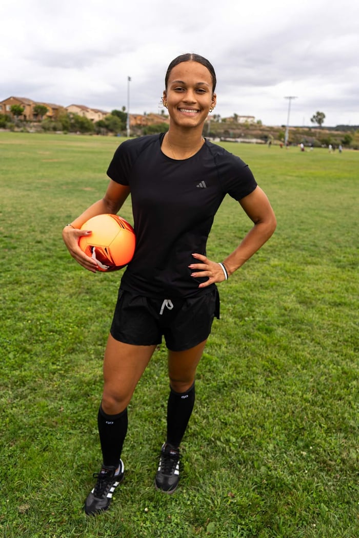Trinity Armstrong wearing GO Sleeves calf compression sleeves on the soccer field