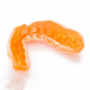 The Surprising Reason Why Your Teeth Night Guard is Turning Orange.