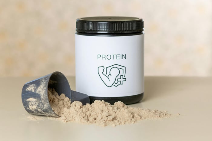 Protein powder container with scoop.