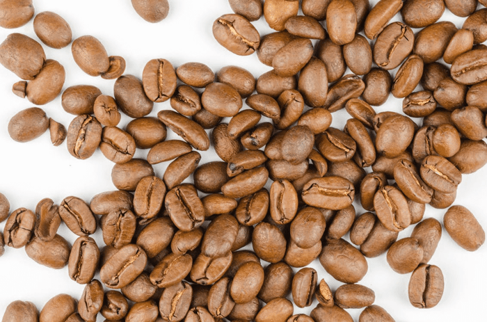 roasted coffee beans scattered