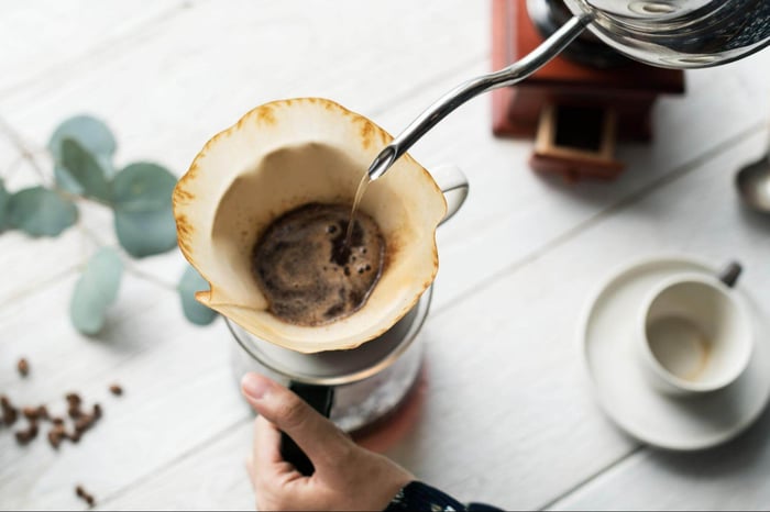 aerial view of person making drip coffee