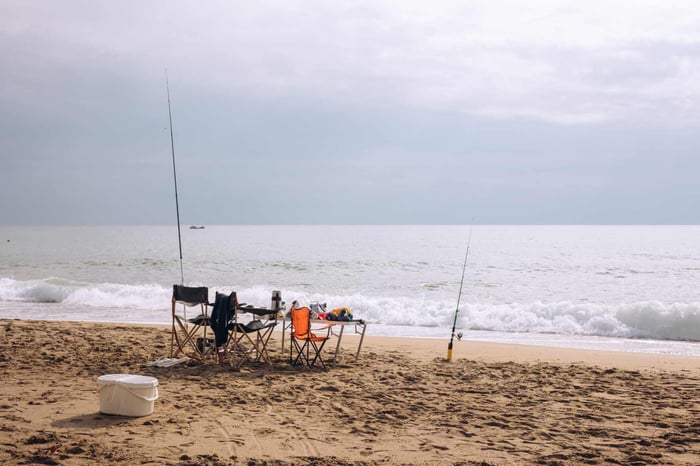 Surf fishing gears by the shore