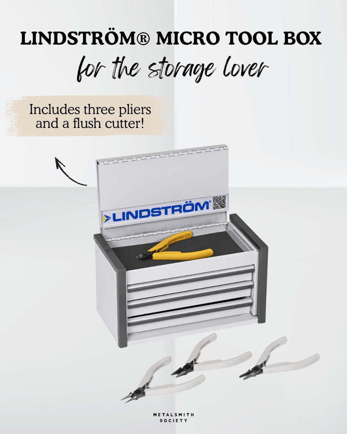 Limited Edition Lindstrom Micro Tool Box Kit from Gesswein shown on a jeweler’s bench. A top-rated gift for jewelry makers featured in the 2025 Metalsmith Society Gift Guide.