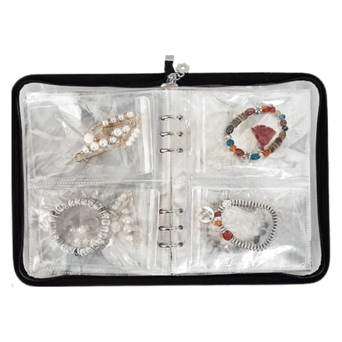 Transparent Jewelry Storage Book with 48 grids and pouches, designed for organizing earrings, rings, necklaces, and bracelets, featuring a durable waterproof PVC material and a zipper closure for travel. Listed on the 2024 Holiday Gift Guide For Jewelers.