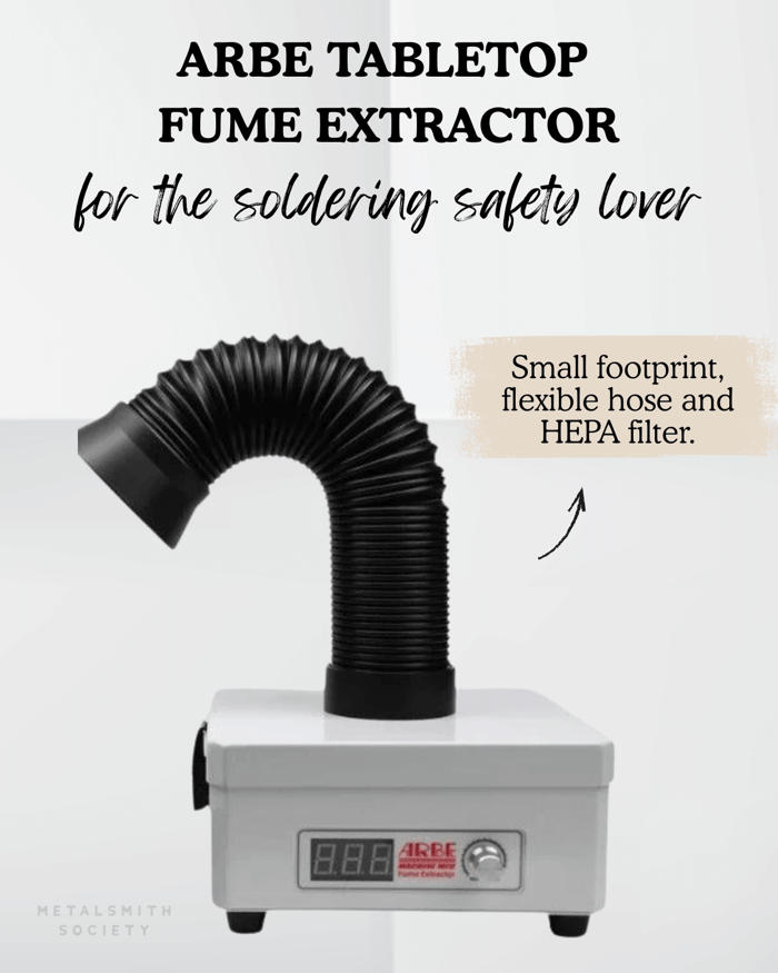 Graphic of the ARBE Tabletop Fume Extractor with flexible hose and digital controls, labeled ‘for the soldering safety lover.’ Compact fume extraction with HEPA filtration, featured in the 2025 Metalsmith Society Gift Guide.