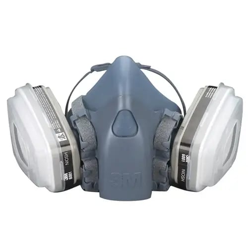3M Half Facepiece Respirator 7502, a comfortable, reusable respirator designed for protection against fumes, dust, and airborne contaminants in jewelry studios.