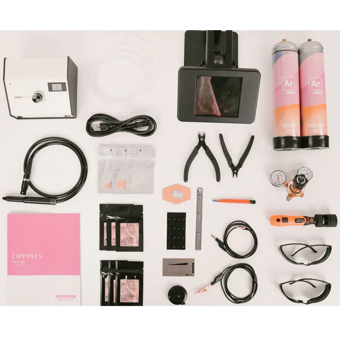 A flat lay of Sunstone's Zapp Plus Starter Kit