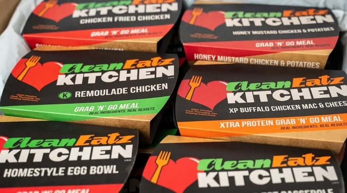 Portion-controlled meals from Clean Eatz Kitchen shown as packaged grab-and-go options with labeled healthy entrees