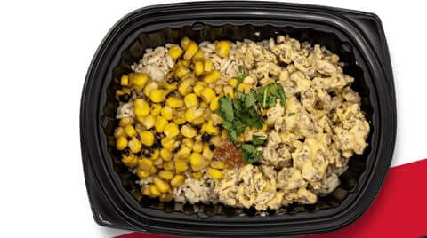 Protein-rich meal prep Southwest beef bowl with rice, charred corn, creamy beef, and cilantro in black tray.