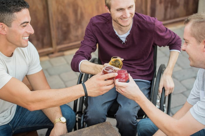 male friends having a drink