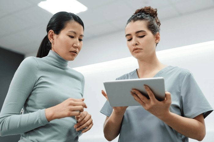 Woman consulting with a healthcare professional
