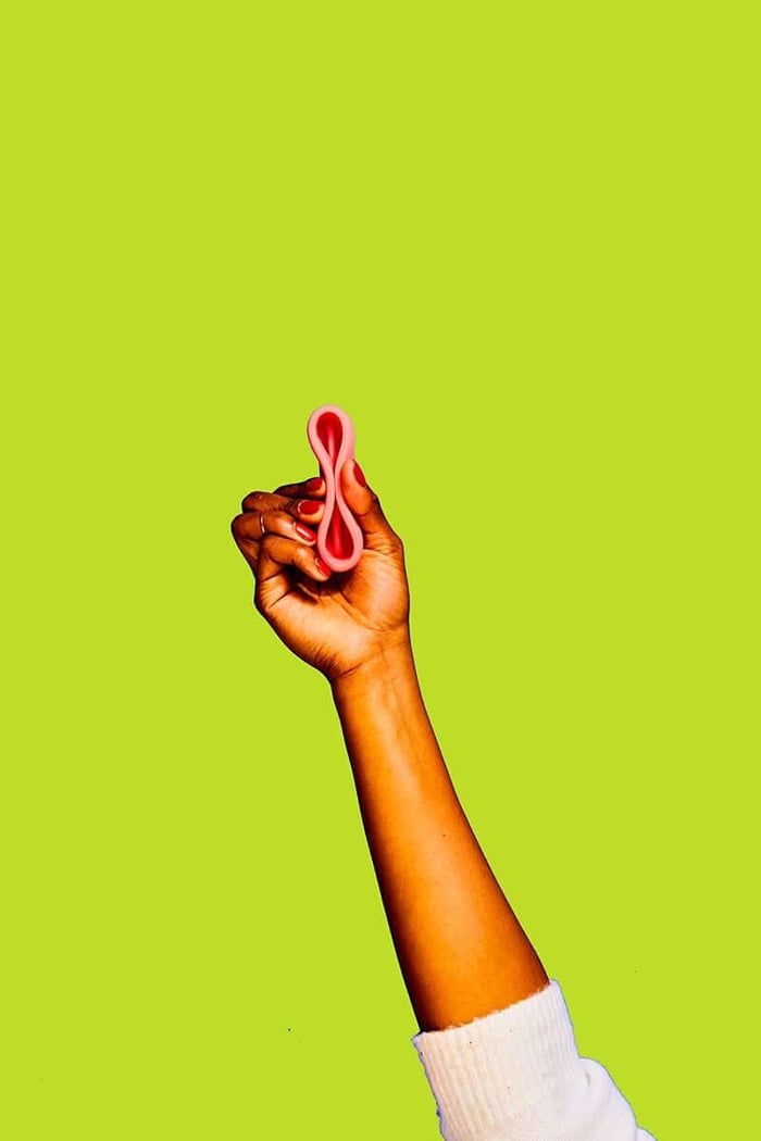 a folded nixit menstrual disc