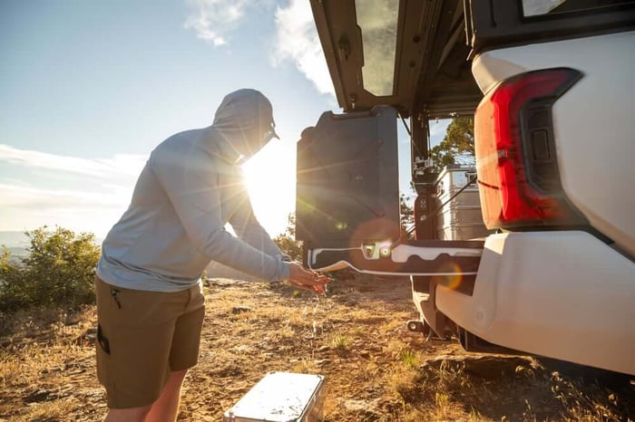 Camp setup is quick with the Alu-Cab ModCAP Tailgate Truck Camper.