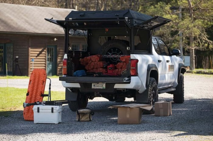 The tailgate drops on the Alu-Cab ModCAP Tailgate truck camper giving you full access to the back of your truck.
