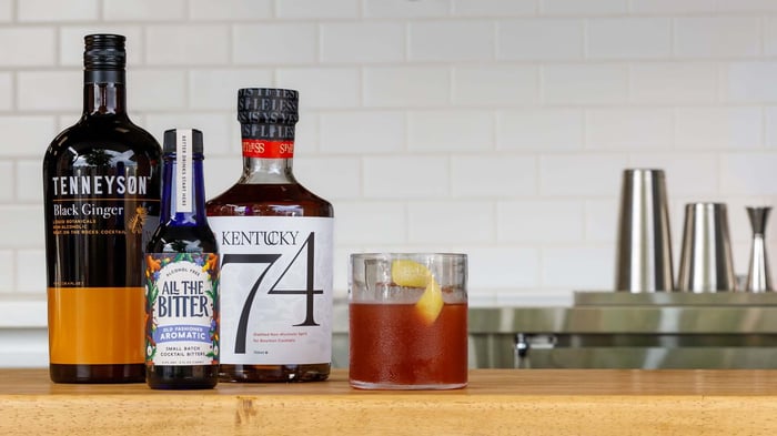 Ginger Old Fashioned mocktail recipe made with non-alcoholic whiskey and bitters.