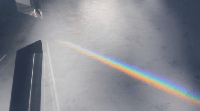A prism refracting white light into a rainbow for "The Energy of Color," Ep02 of Prism Power