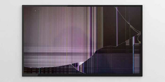Distorted video playback on a screen, representing proprietary video formats that will not open correctly
