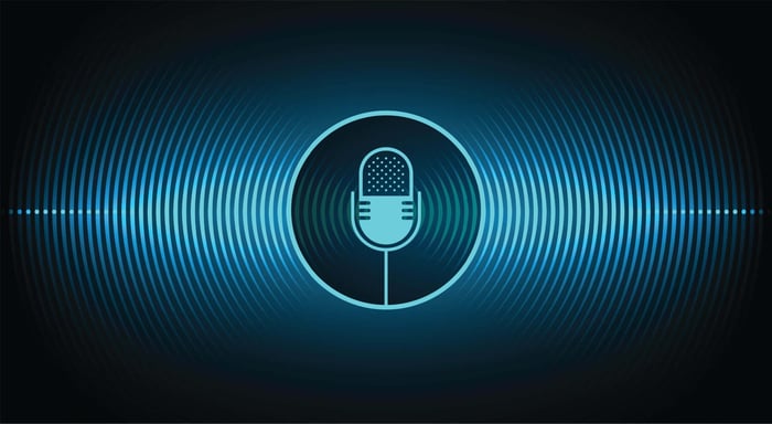 Microphone icon inside a circular audio waveform, representing forensic audio cleanup and enhancement
