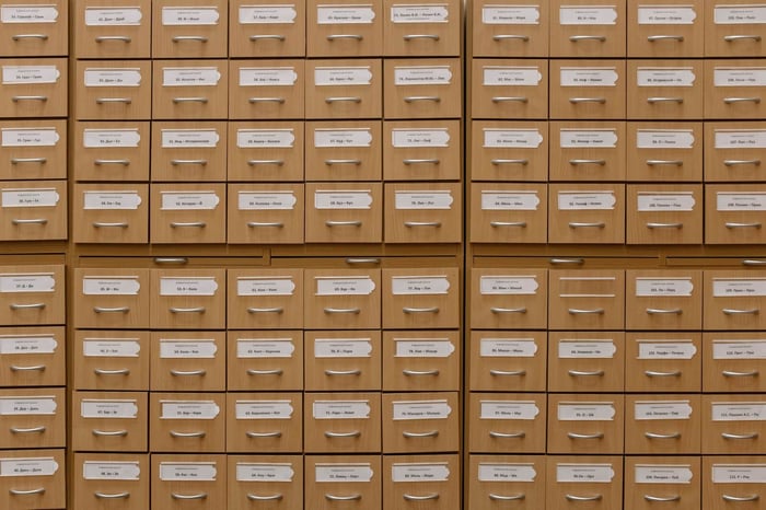 Wall of labeled archive storage boxes representing the volume of public records agencies manage under body camera public records law