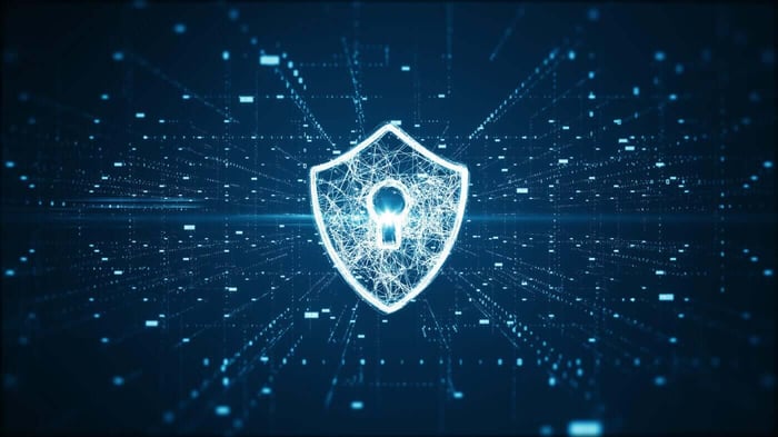 Glowing shield and padlock icon, representing confidentiality and security controls at a redaction provider