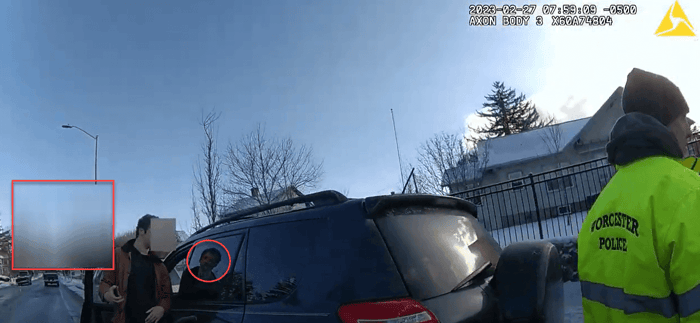 Body worn camera frame showing a redaction mask that failed to track a moving subject