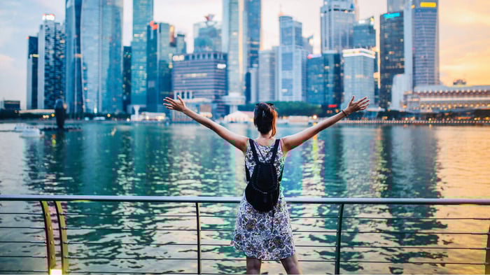 woman standing by the waterfront at Marina Bay