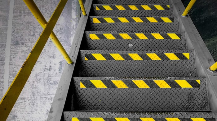 Mighty Line floor tape on steel stairs