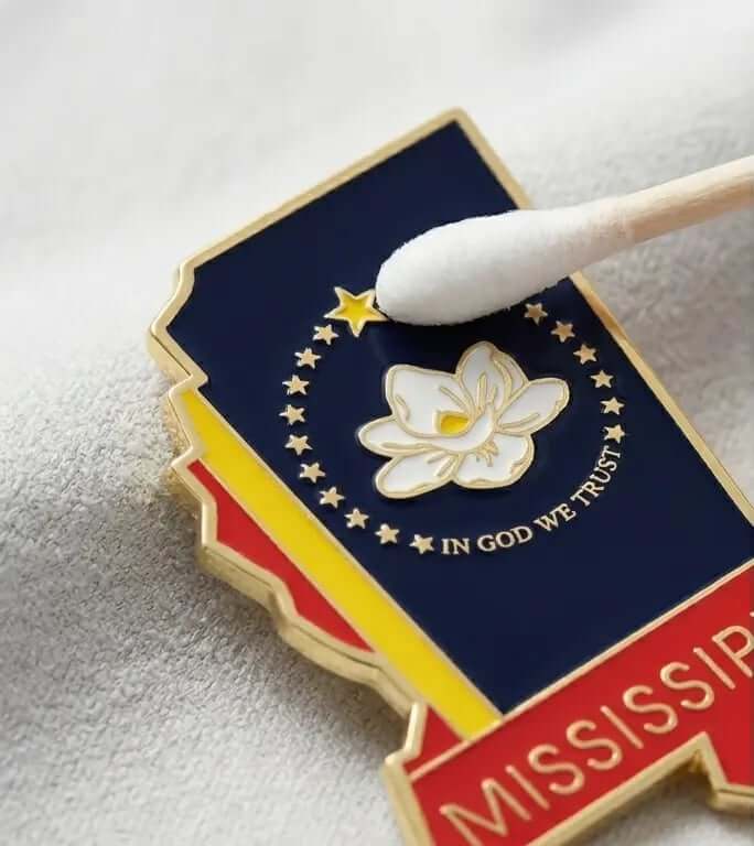 Mississippi Pin cleaning with a QTip