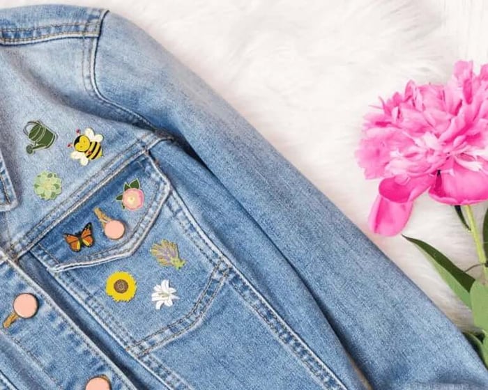 Flowers and Nature Pins and Patches collage on jean jacket