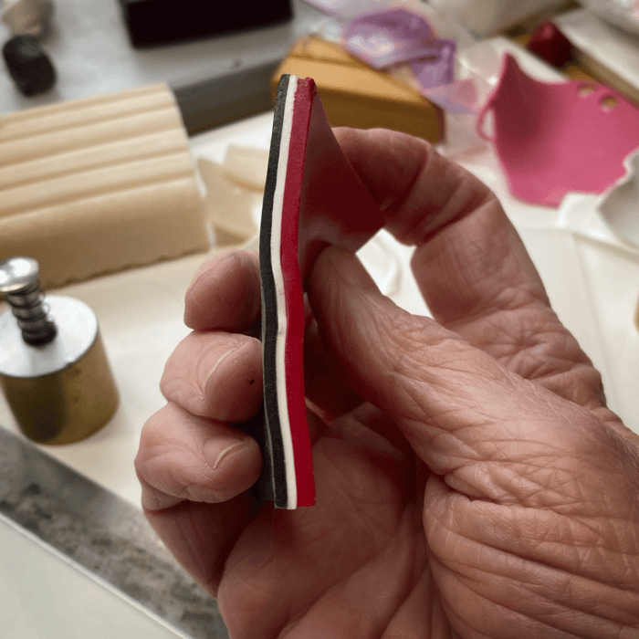 Red, White and Black layers of polymer clay