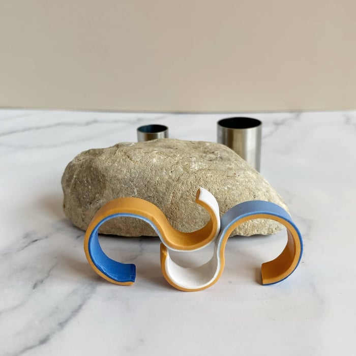 S shaped polymer clay beads stacked together