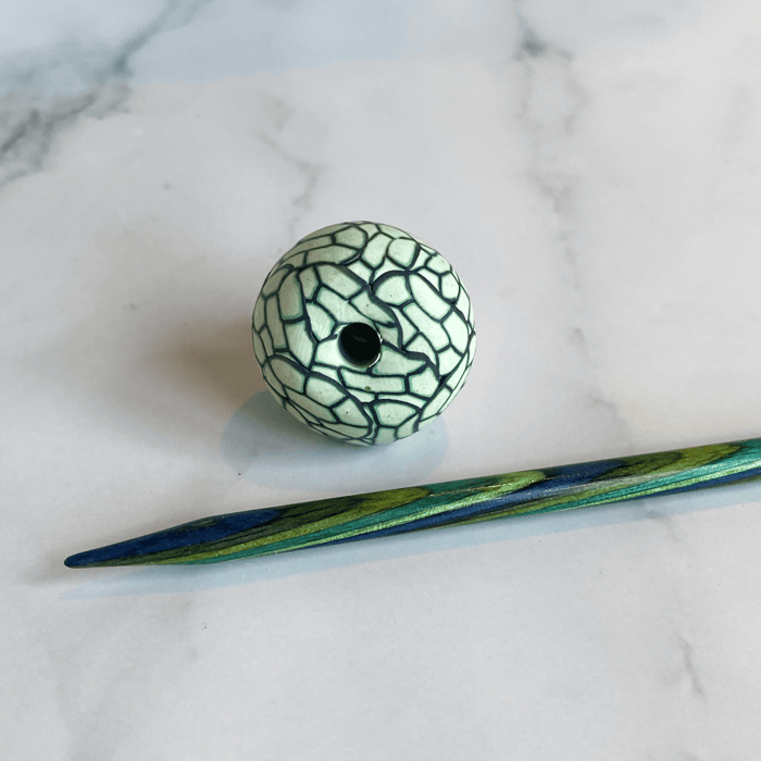 Big hole polymer clay bead in shades of green