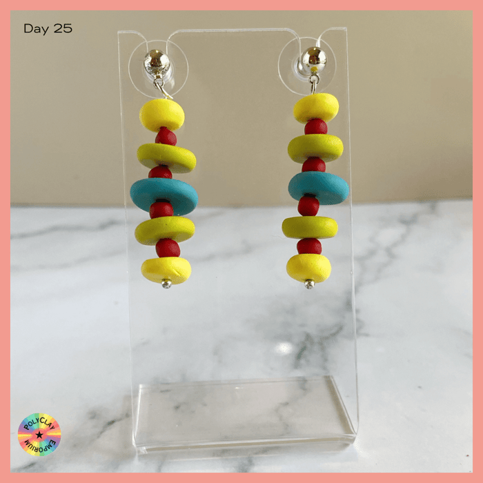 Cairn polymer clay earrings in vibrant spring colors.