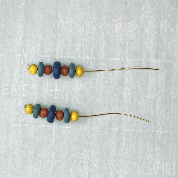 Polymer clay beads strung on the wire.