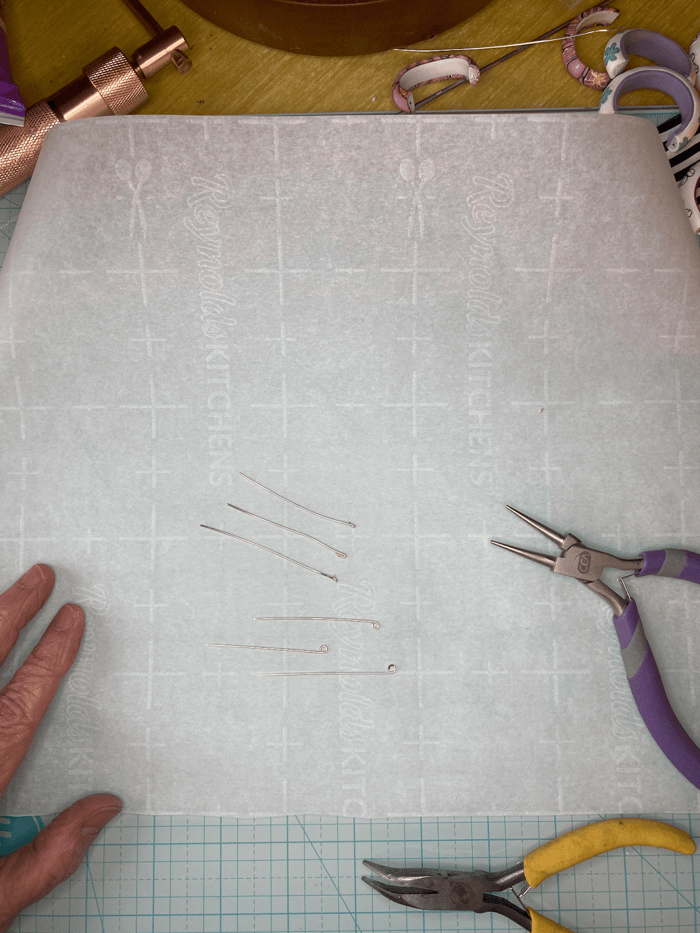 The same wires with teeny tiny loop on the ends.
