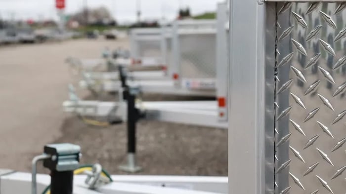 Close up of trailer hitches in a yard