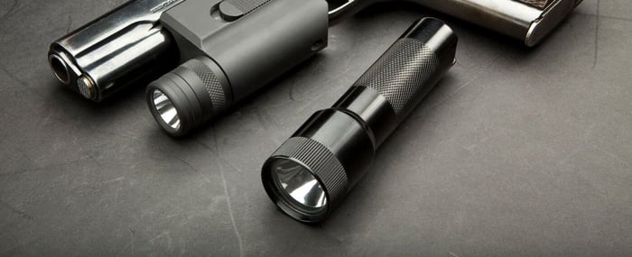 SUREFIRE HISTORY: THE LPC MODEL 7 LASER AIMING DEVICE