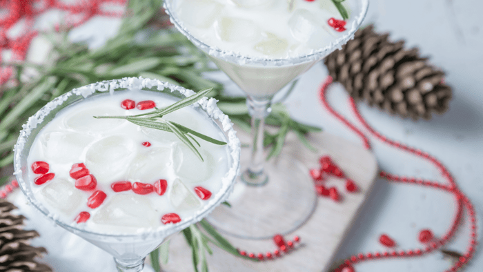 White Christmas Cocktail with Pomegranate and Rosemary