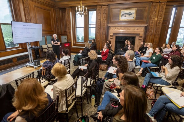 Group of women at literacy conference presentation