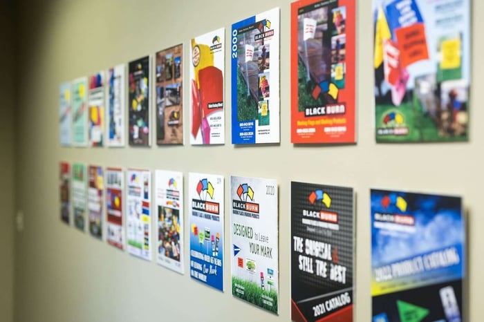 blackburn catalog covers on wall