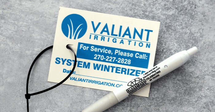 custom irrigation tag over grey surface