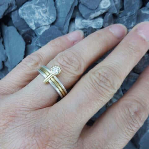 Contemporary platinum, gold and diamond ring commission