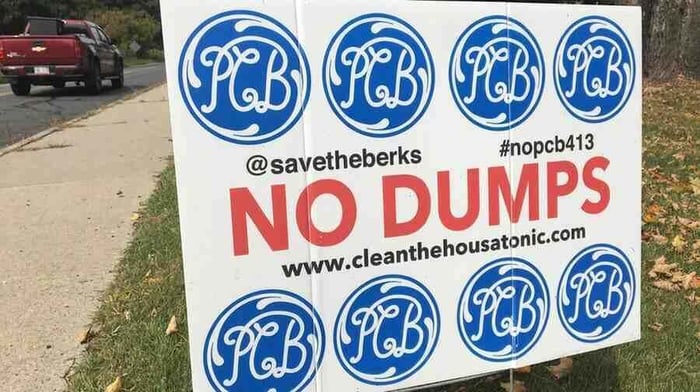 A lawn sign in Lee, Massachusetts, designed by Reed Anderson of Great Barrington, calls for no local dumps for PCB waste from General Electric .// Source - Image Taken In Lee, MA