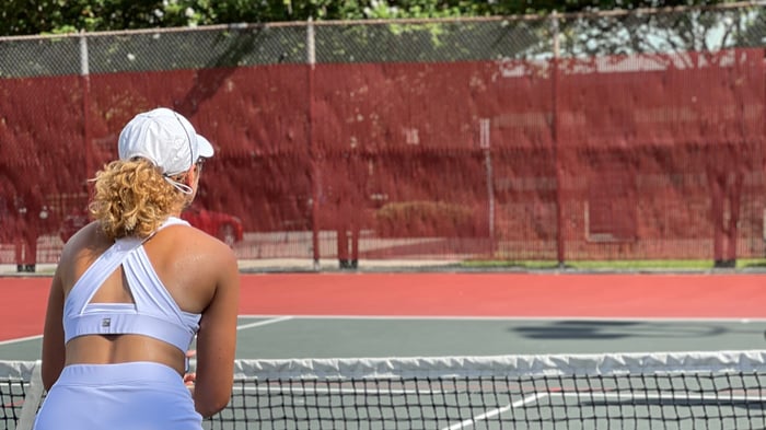 Pickleball player returning a shot