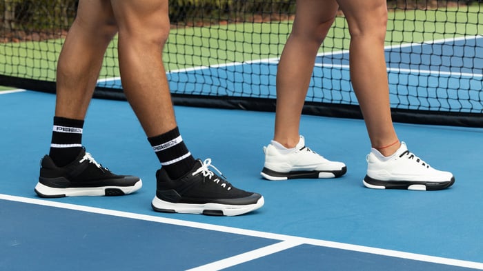Pickleball players on a court