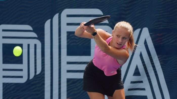 Pro pickleball player Hannah Blatt about to hit a pickleball
