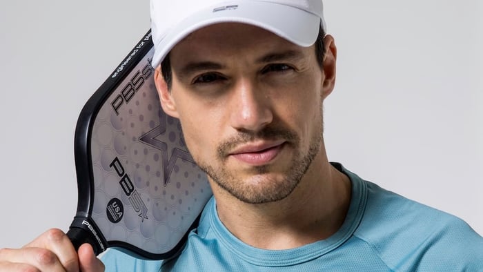 Man wearing PB5stra hat with the Balance paddle